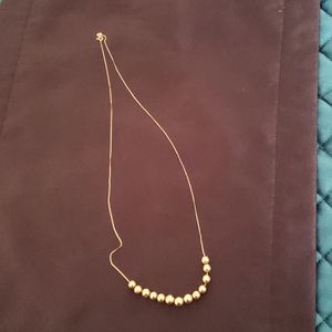 Gold ball necklace